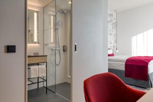 Postel nebo postele na pokoji v ubytování IntercityHotel Berlin Airport BER Terminal 1 & 2
