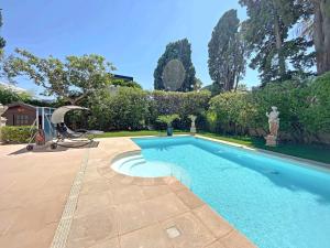 Zdjęcie z galerii obiektu Villa Palmiers by ESTATESCANNES w Cannes