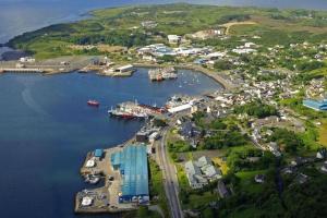 an aerial view of a harbor with boats in the water at Seaside 3 Bed Killybegs Property on Main Street in Killybegs