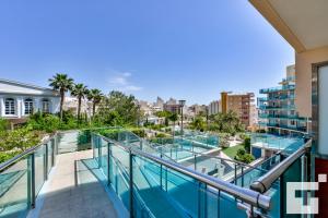 a balcony with a view of the city at Apartamento Borumbot 26 - Grupo Turis in Calpe