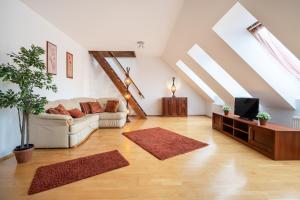 A television and/or entertainment centre at Beautiful apartment with AC