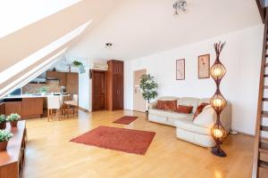 A seating area at Beautiful apartment with AC Még 14 kép