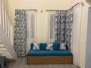 A seating area at Aleminas Rooms