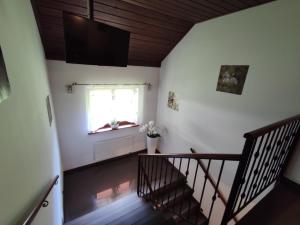 Giường trong phòng chung tại Rezydencja Wiślane Zacisze