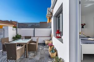 Posezení v ubytování Loft A'ca La Puri en Melegís