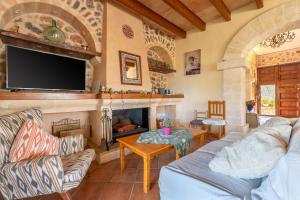 TV a/nebo společenská místnost v ubytování Casa Julia by Mallorca House Rent