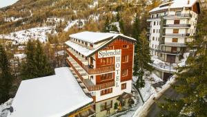 an aerial view of a hotel in the snow at Hotel Splendid in Sauze dʼOulx
