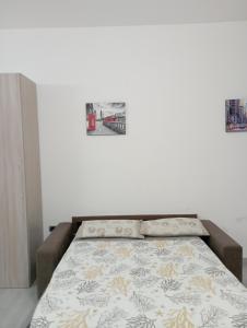Posteľ alebo postele v izbe v ubytovaní Don Bosco
