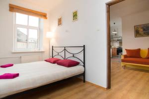Cama o camas de una habitación en Riga City Center Apartments