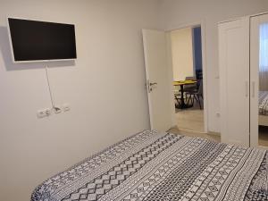 Кровать или кровати в номере Apartment Aria