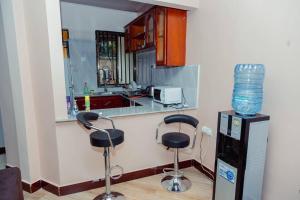 Fotografie z fotogalerie ubytování 2 Bed Apartment Sleeps 4 - Garden Wifi Parking v destinaci Moshi