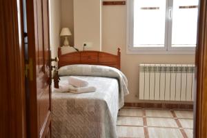 Postel nebo postele na pokoji v ubytování CASA RAICHU