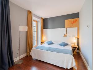Letto o letti in una camera di Hotel El Coloquio