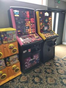 two video game machines are next to each other at Caravan L16 in Mablethorpe