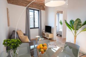 TV a/nebo společenská místnost v ubytování Feelathome Stadium Apartments