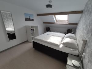 Postel nebo postele na pokoji v ubytování B&B Bouwmanshoeve