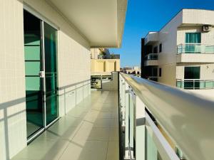 a balcony with a view of a building at Venha Curtir as Melhores Praias de Cabo Frio 306 in Cabo Frio