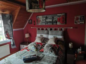 Postel nebo postele na pokoji v ubytování Le Vieux Logis