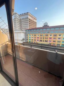 a view from a window of a building at Babylon Residence Inn pattaya in Pattaya South