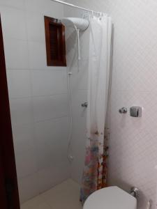 Koupelna v ubytování Apartamento Mari em Capão da Canoa RS