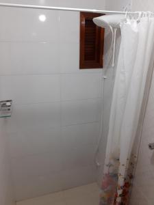 Koupelna v ubytování Apartamento Mari em Capão da Canoa RS