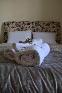 Ένα ή περισσότερα κρεβάτια σε δωμάτιο στο Stavros Niarhos apartment