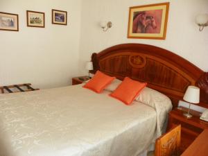 Postel nebo postele na pokoji v ubytování Hotel Savona