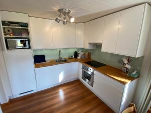 Dapur atau dapur kecil di Apartment Arvenbüel-Flüügespitz