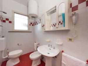 Ένα μπάνιο στο Apartments in Lignano 21774