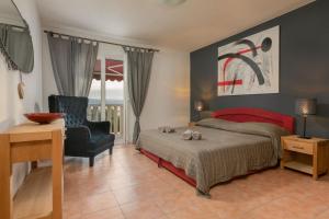 Postel nebo postele na pokoji v ubytování Apartments Kate