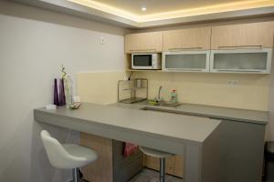 Η κουζίνα ή μικρή κουζίνα στο Gogolapartman Maros