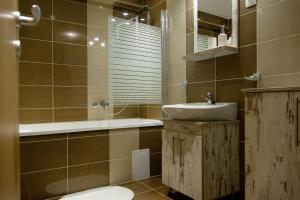 Ένα μπάνιο στο Gogolapartman Maros