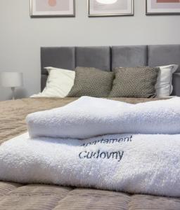 Posteľ alebo postele v izbe v ubytovaní Apartament Cudovny