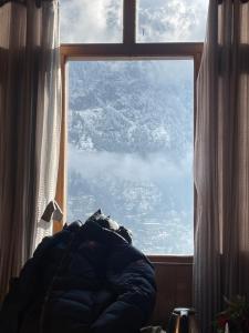 Predel za sedenje v nastanitvi La Voglia-Old Manali