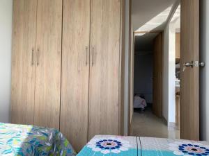 Cama o camas de una habitación en Apartamento Punta Gaira