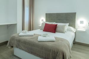 A bed or beds in a room at A&M CAVA