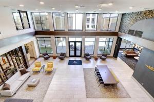 an overhead view of a lobby with chairs and tables at Private Rooftop Terrance-Walk Score 81-Shopping District-King Bed-Parking 4003 in Scottsdale