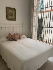 Posteľ alebo postele v izbe v ubytovaní EL RINCON DEL CONDE