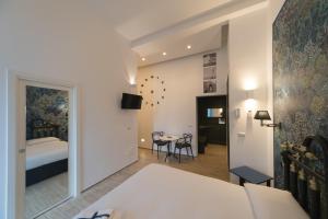 Postel nebo postele na pokoji v ubytování B&B Al Vico