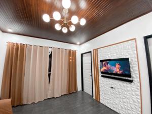 TV a/nebo společenská místnost v ubytování Das Haus