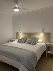 Ένα ή περισσότερα κρεβάτια σε δωμάτιο στο Costa Sur Apartamento en San Agustín