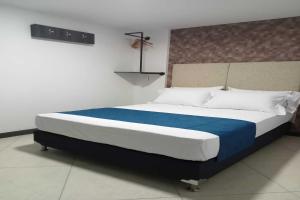 Cama o camas de una habitación en Hotel Jerusalen Estadio
