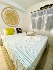 Ліжко або ліжка в номері Pousada E Hostel Pernambucana