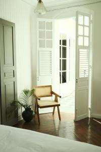 Postel nebo postele na pokoji v ubytování Maison Victoire, boutique hôtel - Pointe-à-Pitre