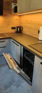 A kitchen or kitchenette at Appartement Waldzauber