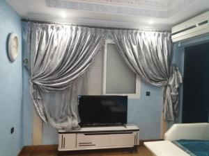 Μια τηλεόραση ή/και κέντρο ψυχαγωγίας στο Prestige, Luxe au Centre Ville +9 φωτογραφίες