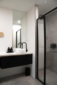a bathroom with a sink and a shower at Riverstone in Porepunkah +104 photos