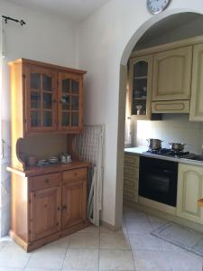 Kuchyň nebo kuchyňský kout v ubytování Casa di Rosa