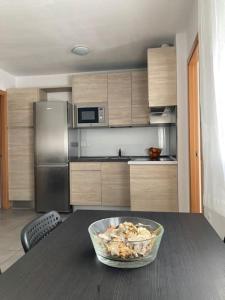 A kitchen or kitchenette at Fantástico apartamento en Triana