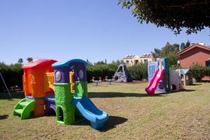 a group of childrens play equipment in a park at Makronisos Village in Ayia Napa